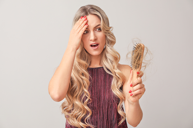 causas de caida de cabello en mujeres